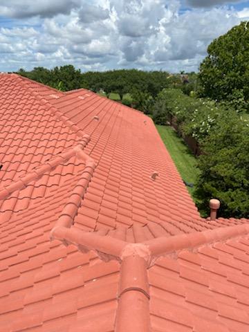Home exterior showing Roof cleaning near me in Deltona, FL with improved roof color consistency