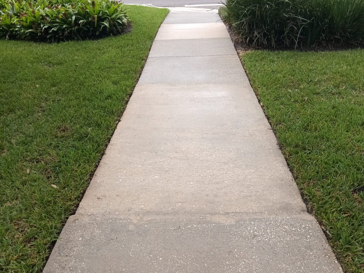 Residential exterior after Maintenance Cleaning in Lake Nona, FL with refreshed outdoor surfaces Residential exterior after Maintenance Cleaning in Lake Nona, FL with refreshed outdoor surfaces