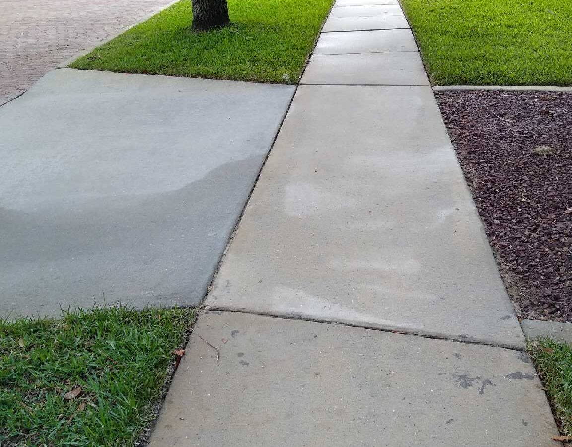 Front entrance after Maintenance Cleaning near me in Celebration, FL with clean walkways and exterior surfaces Front entrance after Maintenance Cleaning near me in Celebration, FL with clean walkways and exterior surfaces