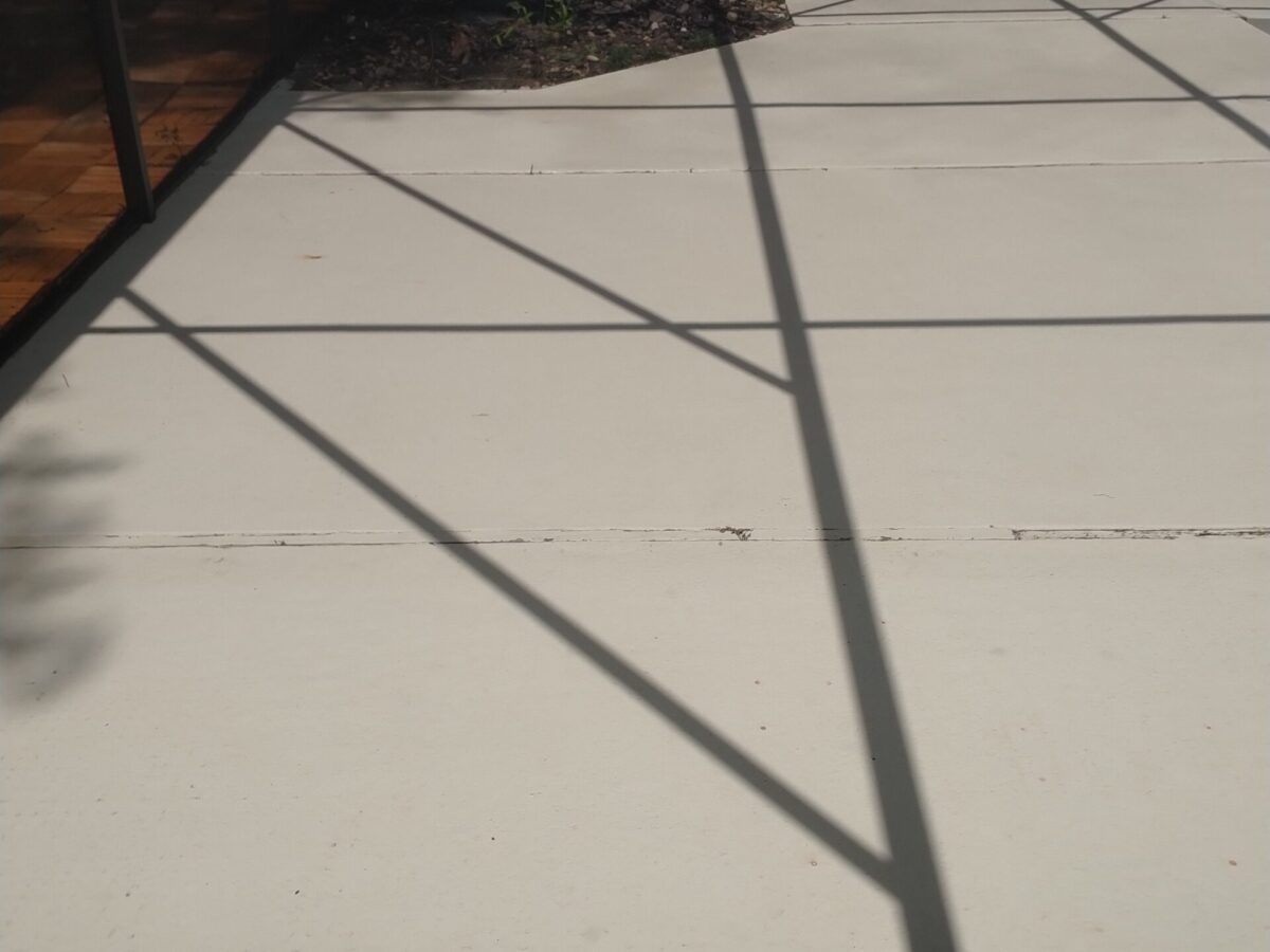 Homeowner scheduling maintenance cleaning near me in Sanford, FL to keep outdoor entertaining areas looking their best