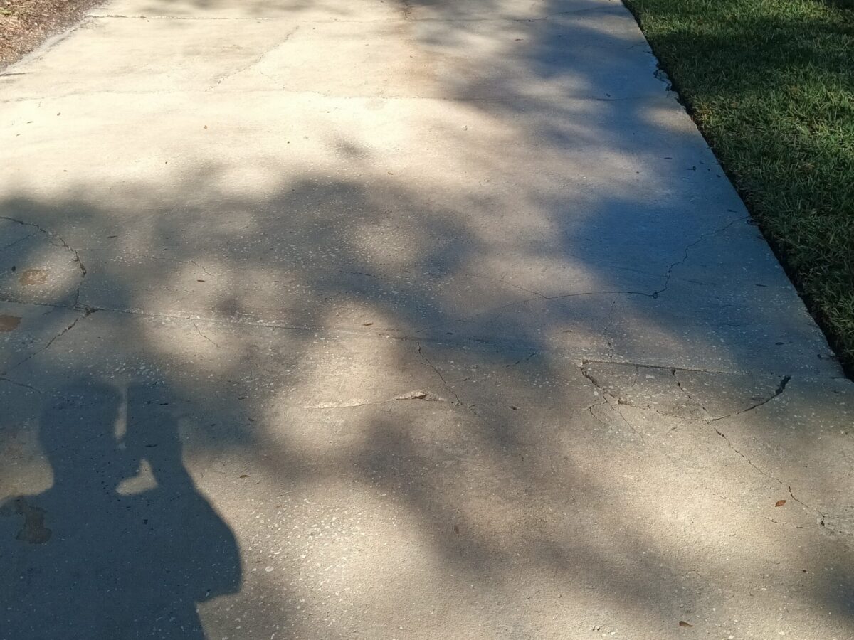 Scheduled maintenance cleaning near me in Lake Mary, FL helping preserve clean patios, driveways, and landscaped entrances