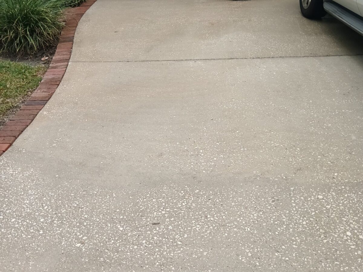 Family property refreshed after Maintenance Cleaning in Deltona, FL with a clean driveway, fence, and front walkway Family property refreshed after Maintenance Cleaning in Deltona, FL with a clean driveway, fence, and front walkway