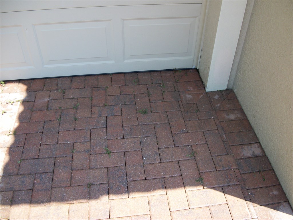 Local team providing maintenance cleaning near me in DeBary, FL around a screened patio and backyard recreation area