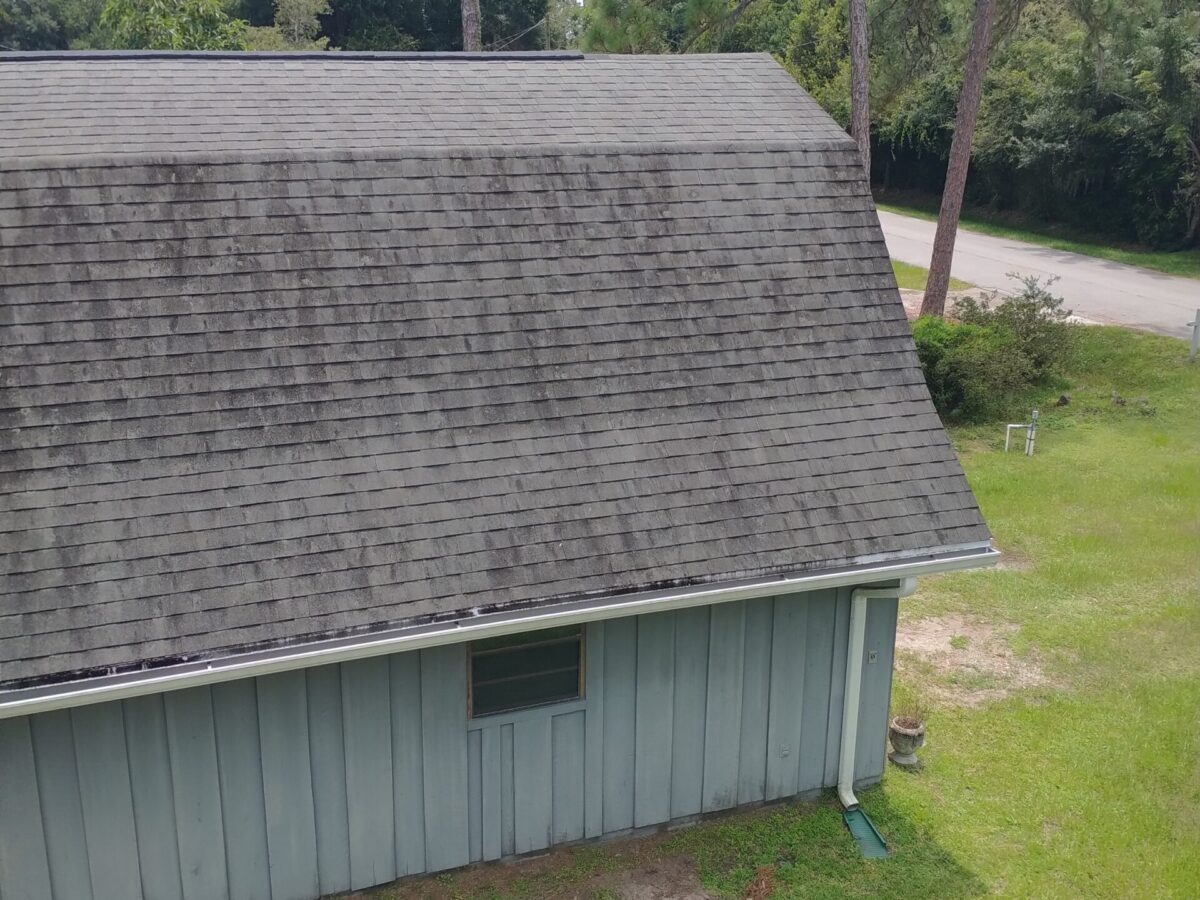 Professional exterior building cleaning near me in Sanford, FL addressing awning-adjacent surfaces outside a commercial property