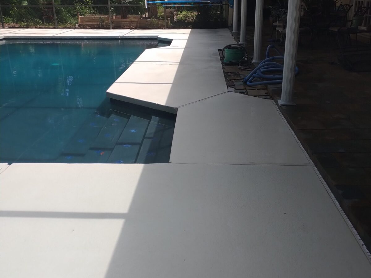 Road-facing commercial property after Exterior Building Cleaning in Narcoossee, FL with refreshed walls and entrance features Road-facing commercial property after Exterior Building Cleaning in Narcoossee, FL with refreshed walls and entrance features